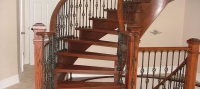 Should painted balusters be installed at the same time as the stair or later?